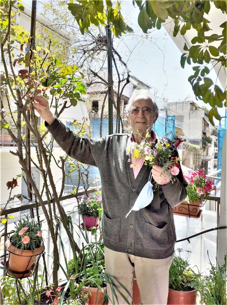 13——Με τα λουλούδια του.